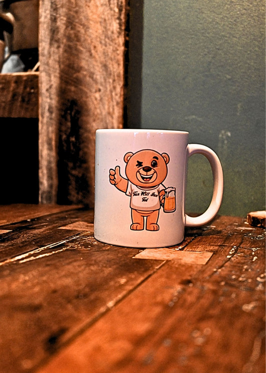 Ceramic White Mug With Tan Hill Ted with a Beer